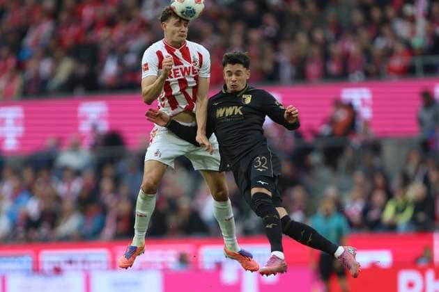 Eric Martel (1. FC Koeln) und Fabian Rieder (FC Augsburg) im Zweikampf waehrend des spiels der Bundesliga zwischen 1. FC Köln und FC Augsburg, RheinEnergieSTADION am 18. October 2025 in Köln, Deutschland. (Foto von Oliver Kaelke DeFodi Images) +++ Eric Martel (1. FC Koeln) und Fabian Rieder (FC Augsburg) battle for the ball during the Bundesliga match between 1. FC Köln and FC Augsburg at RheinEnergieSTADION on October 18, 2025 in Köln, Germany. (Photo by Oliver Kaelke DeFodi Images) DFL regulations prohibit any use of photographs as image sequences and or quasi-video. (Photo by Oliver Kaelke DeFodi Images) Eric Martel 1 FC Koeln und Fabian Rieder FC Augsburg im Zweikampf waehrend des spiels der Bundesliga zwischen 1 FC Köln und FC Augsburg, RheinEnergieSTADION am 18 October 2025 in Köln, Germany Photo by Oliver Kaelke DeFodi Images Eric Martel 1 FC Koeln und Fabian Rieder FC Augsburg battle for the ball during the Bundesliga match between 1 FC Köln and FC Augsburg at RheinEnergieSTADION on October 18, 2025 in Köln, Germany Photo by Oliver Kaelke DeFodi Images DFL regulations prohibit any use of photographs as image sequences and or quasi video Photo by Oliver Kaelke DeFodi Images