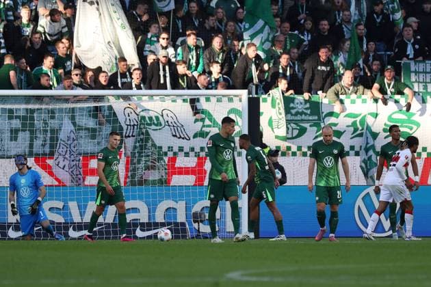 VfL vs Stuttgart, 1 BL Wolfsburg, 18 10 2025, FOOTBALL VfL Wolfsburg vs VfB Stuttgart, 1 BL, Season 2025 26 Adam Daghim VfL Wolfsburg , Adam Daghim VfL Wolfsburg , Christian Eriksen VfL Wolfsburg Wolfsburg