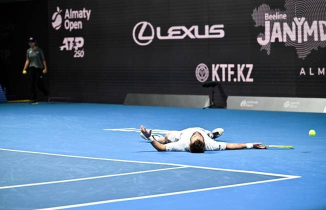 (251019) -- ALMATY, Oct. 19, 2025 -- Corentin Moutet of France celebrates after winning the men s singles semifinal match against Alex Michelsen of the United States at the ATP, Tennis Herren 250 Almaty Tennis Open in Almaty, Kazakhstan, on Oct. 18, 2025. ) (SP)KAZAKHSTAN-ALMATY-TENNIS-ALMATY OPEN-SEMIFINAL LixRenzi 
