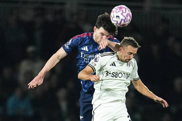 Premier League Fulham v Arsenal Declan Rice of Arsenal wins header over Timothy Castagne of Fulham during the Premier League match Fulham vs Arsenal at Craven Cottage, London, United Kingdom, 18th October 2025 (Photo by Harvey Murphy News Images) Copyright: xHarveyxMurphy NewsxImagesx