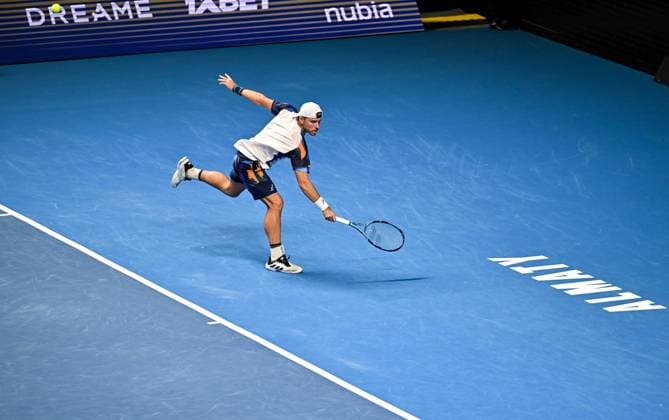 (251019) -- ALMATY, Oct. 19, 2025 -- James Duckworth of Australia hits a return during the men s singles semifinal match against Daniil Medvedev of Russia at the ATP250 Almaty Tennis Open in Almaty, Kazakhstan, on Oct. 18, 2025. ) (SP)KAZAKHSTAN-ALMATY-TENNIS-ALMATY OPEN-SEMIFINAL LixRenzi 