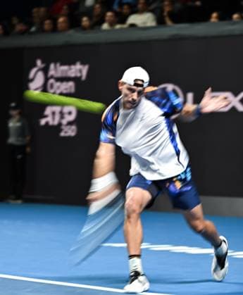 (251019) -- ALMATY, Oct. 19, 2025 -- James Duckworth of Australia hits a return during the men s singles semifinal match against Daniil Medvedev of Russia at the ATP250 Almaty Tennis Open in Almaty, Kazakhstan, on Oct. 18, 2025. ) (SP)KAZAKHSTAN-ALMATY-TENNIS-ALMATY OPEN-SEMIFINAL LixRenzi 