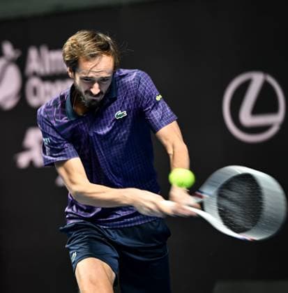 (251019) -- ALMATY, Oct. 19, 2025 -- Daniil Medvedev of Russia hits a return during the men s singles semifinal match against James Duckworth of Australia at the ATP250 Almaty Tennis Open in Almaty, Kazakhstan, on Oct. 18, 2025. ) (SP)KAZAKHSTAN-ALMATY-TENNIS-ALMATY OPEN-SEMIFINAL LixRenzi 