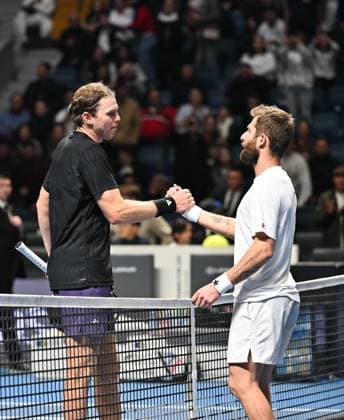 (251019) -- ALMATY, Oct. 19, 2025 -- Corentin Moutet (R) of France shakes hands with Alex Michelsen of the United States after their men s singles semifinal match at the ATP, Tennis Herren 250 Almaty Tennis Open in Almaty, Kazakhstan, on Oct. 18, 2025. ) (SP)KAZAKHSTAN-ALMATY-TENNIS-ALMATY OPEN-SEMIFINAL LixRenzi 