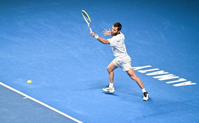 (251019) -- ALMATY, Oct. 19, 2025 -- Corentin Moutet of France hits a return during the men s singles semifinal match against Alex Michelsen of the United States at the ATP, Tennis Herren 250 Almaty Tennis Open in Almaty, Kazakhstan, on Oct. 18, 2025. ) (SP)KAZAKHSTAN-ALMATY-TENNIS-ALMATY OPEN-SEMIFINAL LixRenzi 