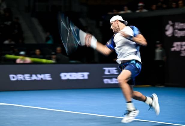 (251019) -- ALMATY, Oct. 19, 2025 -- James Duckworth of Australia hits a return during the men s singles semifinal match against Daniil Medvedev of Russia at the ATP250 Almaty Tennis Open in Almaty, Kazakhstan, on Oct. 18, 2025. ) (SP)KAZAKHSTAN-ALMATY-TENNIS-ALMATY OPEN-SEMIFINAL LixRenzi 