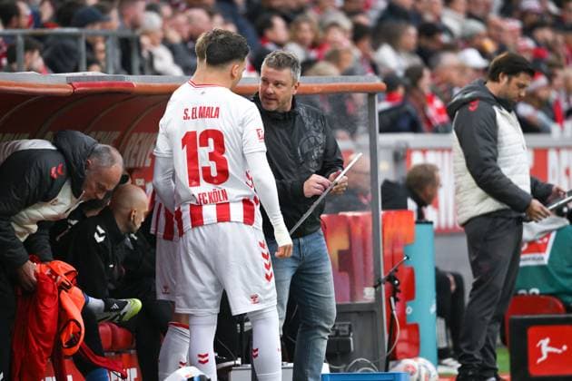Coach Lukas Kwasniok 1 FC Koeln changes Said El Mala 1 FC Koeln and Marius Bülter 1 FC Koeln , li , a 18 10 2025, Soccer 1 Bundesliga, Season 2025 2026, 7 Matchday, 1 FC Köln FC Augsburg 1 1 DFL regulations prohibit any use of photographs as image sequences and or quasi video Koeln RheinEnergieStadion Nordrhein Westfalen Germany Team2