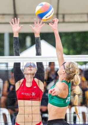 (251019) -- LAGUNA PROVINCE, Oct. 19, 2025 -- Jasmine Fleming (L) of Australia competes against Ieva Dumbauskaite of Lithuania during the women s semifinal match between Ieva Dumbauskaite Gerda Grudzinskaite of Lithuania and Jasmine Fleming Stefanie Fejes of Australia at the Volleyball World Beach Pro Tour in Laguna Province, the Philippines, on Oct. 19, 2025. ) (SP)THE PHILIPPINES-LAGUNA PROVINCE-VOLLEYBALL WORLD BEACH PRO TOUR ROUELLExUMALI 