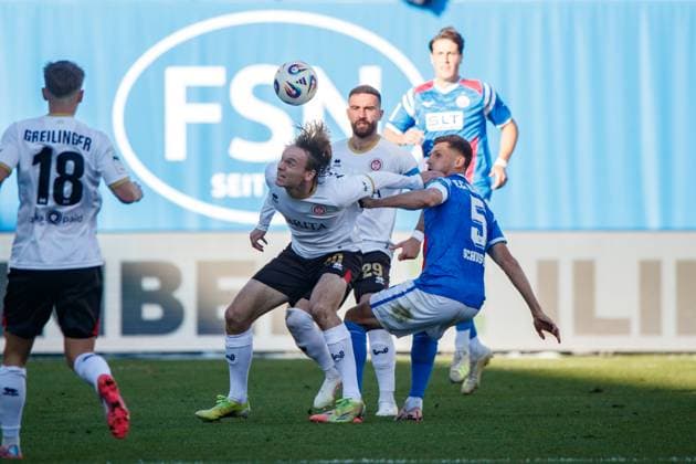 left Ryan Johansson SVW vs Marco Schuster Rostock GER, FC Hansa Rostock vs SV Wehen Wiesbaden, Soccer, Men, 3 League, Matchday 11, Season 2025 2026,18 10 2025 Rostock Ostseestadion Mecklenburg Vorpommern Germany