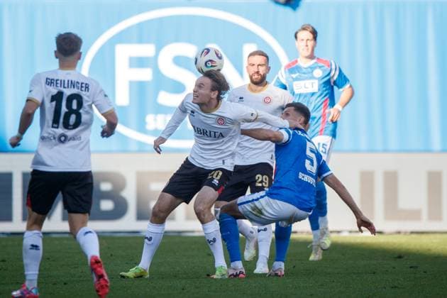 left Ryan Johansson SVW vs Marco Schuster Rostock GER, FC Hansa Rostock vs SV Wehen Wiesbaden, Soccer, Men, 3 League, Matchday 11, Season 2025 2026,18 10 2025 Rostock Ostseestadion Mecklenburg Vorpommern Germany