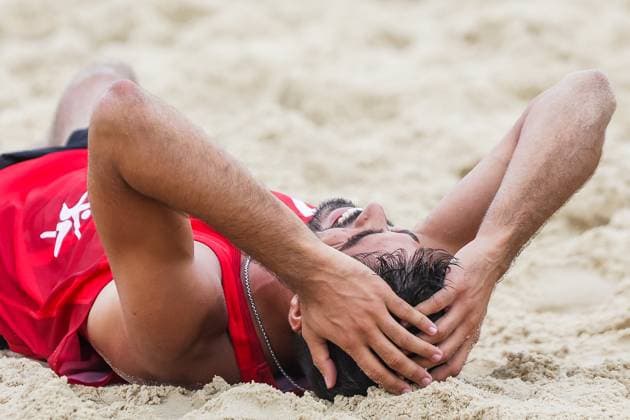 (251019) -- LAGUNA PROVINCE, Oct. 19, 2025 -- Manuel Alfieri of Italy reacts after winning the men s bronze medal match between Manuel Alfieri Alex Ranghieri of Italy and Christoph Dressler Philipp Waller of Austria at the Volleyball World Beach Pro Tour in Laguna Province, the Philippines, Oct. 19, 2025. ) (SP)PHILIPPINES-LAGUNA PROVINCE-VOLLEYBALL-WORLD BEACH PRO TOUR ROUELLExUMALI 