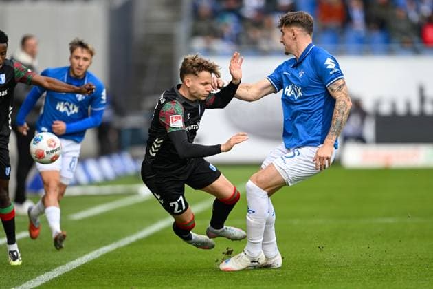 Philipp Hercher 1 FC Magdeburg, 27 in duel with Matej Maglica SV Darmstadt 1898, 05 , GER, SV Darmstadt 98 vs 1 FC Magdeburg Soccer, 2 Bundesliga, Matchday 9, Season 2025 2026, 19 10 2025 DFL REGULATES PROHIBIT ANY USE OF PHOTOGRAPHS AS IMAGE SEQUENCES AND OR QUASI VIDEO GER, SV Darmstadt 98 vs 1 FC Magdeburg Football, 2 Bundesliga, Matchday 9, Season 2025 2026, 19 10 2025 Darmstadt Copyright: xEibner-Pressefoto FlorianxWiegandx EP_FWD