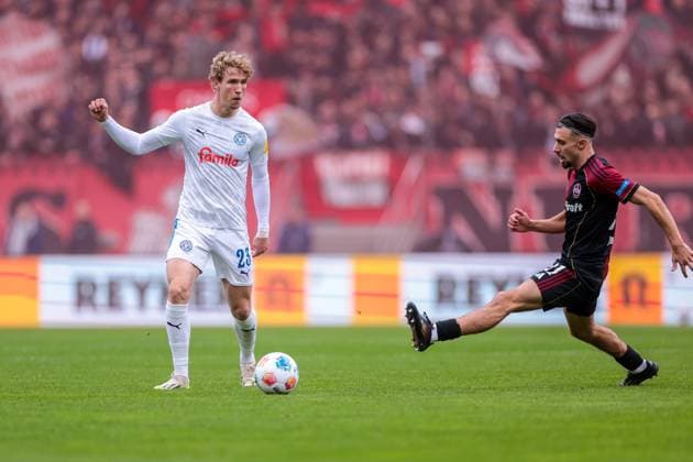 19 10 2025, 2 Bundesliga, Matchday 9, 1 FC Nürnberg Holstein Kiel, v l Lasse Rosenboom Holstein Kiel , Berkay Yilmaz 1 FC Nürnberg , Nürnberg Max Morlock Stadion Bayern Germany xRHR PHOTO DEx Copyright: DennisxEwert RHR-FOTOx RHR-FOTO DE