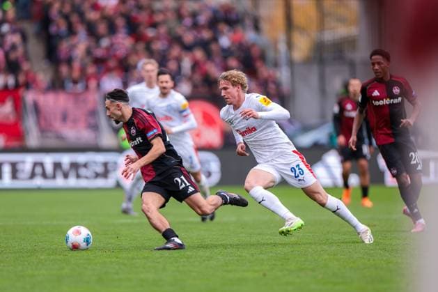 19 10 2025, 2 Bundesliga, Matchday 9, 1 FC Nürnberg Holstein Kiel, v l Berkay Yilmaz 1 FC Nürnberg , Lasse Rosenboom Holstein Kiel , Nürnberg Max Morlock Stadion Bayern Germany xRHR PHOTO DEx Copyright: DennisxEwert RHR-FOTOx RHR-FOTO DE
