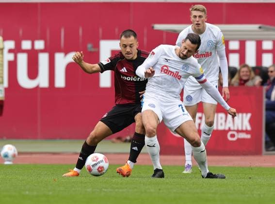 19 10 2025 Soccer Season 2025 2026 2 Soccer Bundesliga 09 Matchday 1 FC Nürnberg FCN Club KSV Holstein Kiel Storks Sportfoto Zink DaMa xdaxmax DFL regulations prohibit any use of photographs as image sequences and or quasi video only for editorial use Julian Justvan 10, 1 FC Nürnberg FCN Steven Skrzybski 7, Holstein Kiel