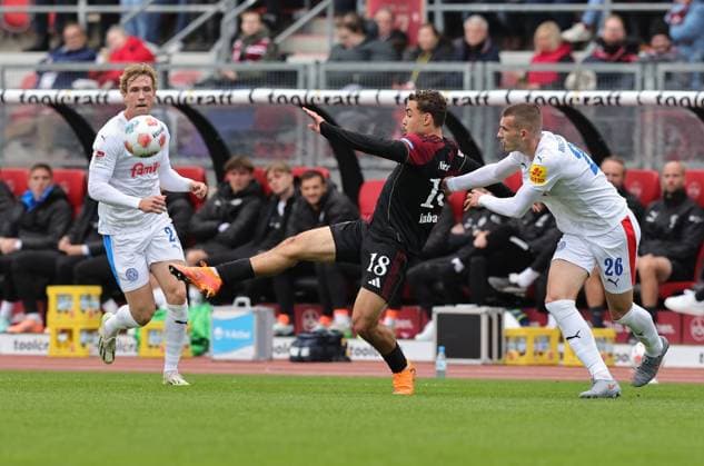 19 10 2025 Soccer Season 2025 2026 2 Soccer Bundesliga 09 Matchday 1 FC Nürnberg FCN Club KSV Holstein Kiel Storks Sportfoto Zink DaMa xdaxmax DFL regulations prohibit any use of photographs as image sequences and or quasi video only for editorial use Lasse Rosenboom 23, Holstein Kiel Rafael Lubach 18, 1 FC Nürnberg FCN David Zec 26, Holstein Kiel