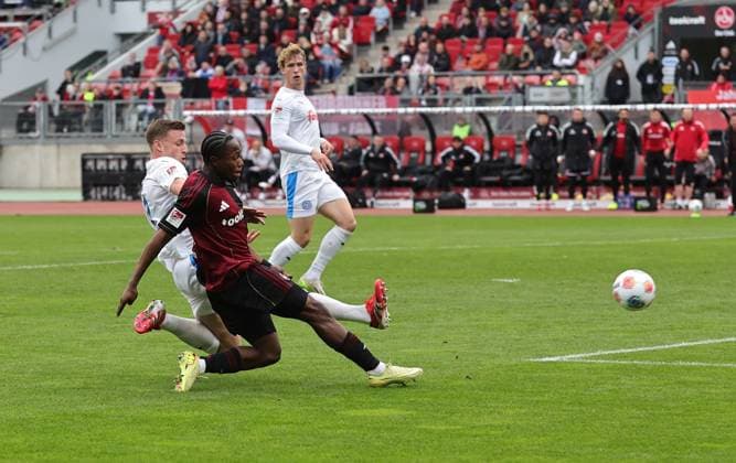 19 10 2025 Soccer Season 2025 2026 2 Soccer Bundesliga 09 Matchday 1 FC Nürnberg FCN Club KSV Holstein Kiel Störche Sportfoto Zink DaMa xdaxmax DFL regulations prohibit any use of photographs as image sequences and or quasi video only for editorial use Tor Treffer Goal shot for 1 0 Goal scorer Mohamed Ali Zoma 23, 1 FC Nürnberg FCN vs Carl Anders Lorentz Johansson 5, Holstein Kiel