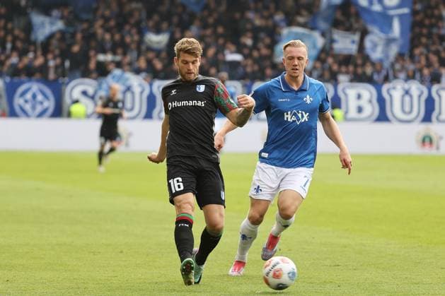 19 10 2025, xtvx, Fußball 2 Bundesliga, SV Darmstadt 98 1 FC Magdeburg v l Zweikampf, Duell, duel, tackle, compete Marcus Mathisen 1 FC Magdeburg Isac Lidberg SV Darmstadt 98 DFL DFB REGULATIONS PROHIBIT ANY USE OF PHOTOGRAPHS as IMAGE SEQUENCES and or QUASI VIDEO Darmstadt