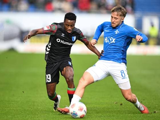 Lubambo Musonda 1 FC Magdeburg, 19 in duel with Luca Marseiler SV Darmstadt 1898, 08 , GER, SV Darmstadt 98 vs 1 FC Magdeburg Soccer, 2 Bundesliga, Matchday 9, Season 2025 2026, 19 10 2025 DFL REGULATES PROHIBIT ANY USE OF PHOTOGRAPHS AS IMAGE SEQUENCES AND OR QUASI VIDEO GER, SV Darmstadt 98 vs 1 FC Magdeburg Football, 2 Bundesliga, Matchday 9, Season 2025 2026, 19 10 2025 Darmstadt Copyright: xEibner-Pressefoto FlorianxWiegandx EP_FWD