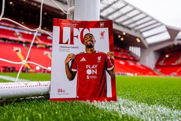 Football - FA Premier League - Liverpool FC v Manchester United, ManU FC LIVERPOOL, ENGLAND - Sunday, October 19, 2025: Liverpool s Ryan Gravenberch features on the cover of the official matchday programme promoting Standard Chartered s Play On charity seen before the FA Premier League match between Liverpool FC and Manchester United FC at Anfield. (Photo by David Rawcliffe Propaganda) LIVERPOOL Anfield MERSEYSIDE ENGLAND  Copyright: xDavidxRawcliffex P2025-10-19-Liverpool_Man_Utd-4