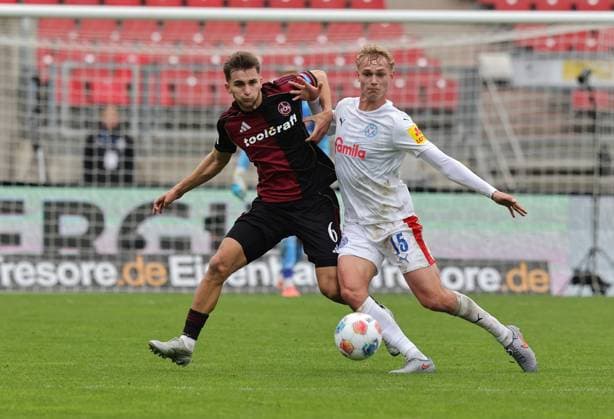 19 10 2025 Soccer Season 2025 2026 2 Soccer Bundesliga 09 Matchday 1 FC Nürnberg FCN Club KSV Holstein Kiel Storks Sportfoto Zink DaMa xdaxmax DFL regulations prohibit any use of photographs as image sequences and or quasi video only for editorial use Adam Markhiev 6, 1 FC Nürnberg FCN Kasper Davidsen 15, Holstein Kiel