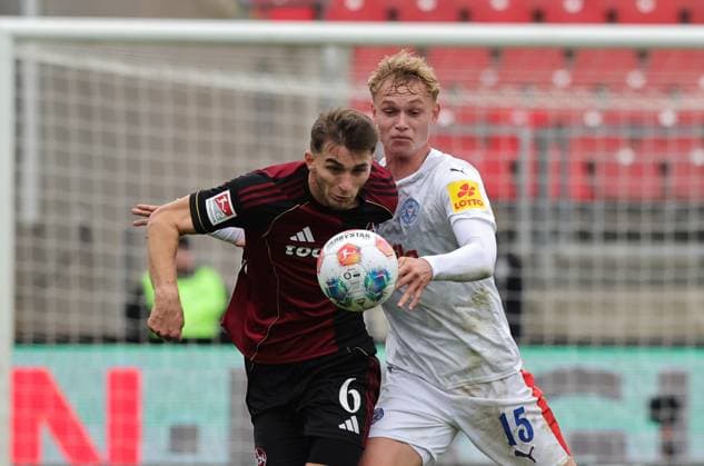 19 10 2025 Soccer Season 2025 2026 2 Soccer Bundesliga 09 Matchday 1 FC Nürnberg FCN Club KSV Holstein Kiel Storks Sportfoto Zink DaMa xdaxmax DFL regulations prohibit any use of photographs as image sequences and or quasi video only for editorial use Adam Markhiev 6, 1 FC Nürnberg FCN Kasper Davidsen 15, Holstein Kiel