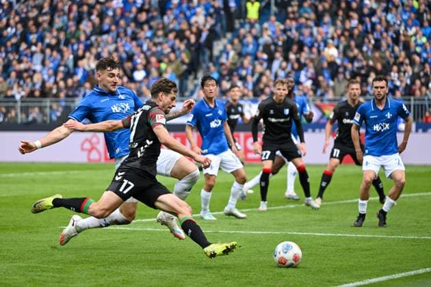 Matej Maglica SV Darmstadt 1898, 05 in duel with Alexander Nollenberger 1 FC Magdeburg, 17 , GER, SV Darmstadt 98 vs 1 FC Magdeburg Soccer, 2 Bundesliga, Matchday 9, Season 2025 2026, 19 10 2025 DFL REGULATES PROHIBIT ANY USE OF PHOTOGRAPHS AS IMAGE SEQUENCES AND OR QUASI VIDEO GER, SV Darmstadt 98 vs 1 FC Magdeburg Football, 2 Bundesliga, Matchday 9, Season 2025 2026, 19 10 2025 Darmstadt Copyright: xEibner-Pressefoto FlorianxWiegandx EP_FWD