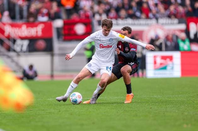 19 10 2025, 2 Bundesliga, Matchday 9, 1 FC Nürnberg Holstein Kiel, f l Magnus Knudsen Holstein Kiel , Tarek Buchmann 1 FC Nürnberg , Nürnberg Max Morlock Stadion Bayern Germany xRHR PHOTO DEx Copyright: DennisxEwert RHR-FOTOx RHR-FOTO DE