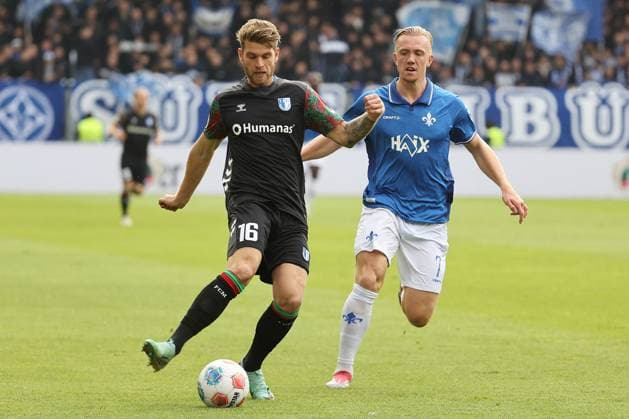 19 10 2025, xtvx, Fußball 2 Bundesliga, SV Darmstadt 98 1 FC Magdeburg v l Zweikampf, Duell, duel, tackle, compete Marcus Mathisen 1 FC Magdeburg Isac Lidberg SV Darmstadt 98 DFL DFB REGULATIONS PROHIBIT ANY USE OF PHOTOGRAPHS as IMAGE SEQUENCES and or QUASI VIDEO Darmstadt