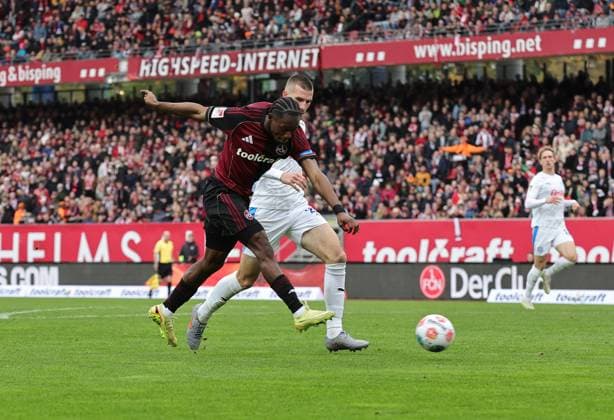 19 10 2025 Soccer Season 2025 2026 2 Soccer Bundesliga 09 Matchday 1 FC Nürnberg FCN Club KSV Holstein Kiel Storks Sportfoto Zink DaMa xdaxmax DFL regulations prohibit any use of photographs as image sequences and or quasi video only for editorial use Mohamed Ali Zoma 23, 1 FC Nürnberg FCN with shot on goal gg David Zec 26, Holstein Kiel
