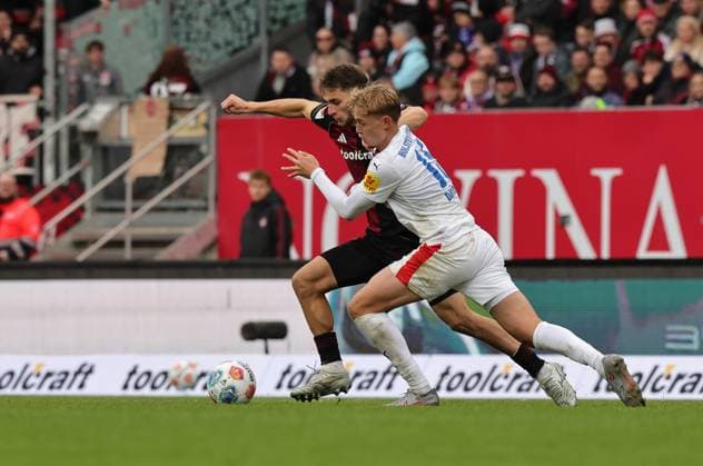 19 10 2025 Soccer Season 2025 2026 2 Soccer Bundesliga 09 Matchday 1 FC Nürnberg FCN Club KSV Holstein Kiel Storks Sportfoto Zink DaMa xdaxmax DFL regulations prohibit any use of photographs as image sequences and or quasi video only for editorial use Adam Markhiev 6, 1 FC Nürnberg FCN Kasper Davidsen 15, Holstein Kiel