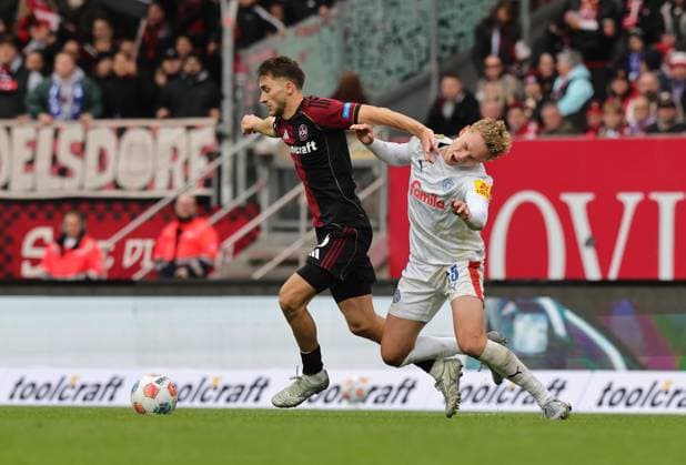 19 10 2025 Soccer Season 2025 2026 2 Soccer Bundesliga 09 Matchday 1 FC Nürnberg FCN Club KSV Holstein Kiel Storks Sportfoto Zink DaMa xdaxmax DFL regulations prohibit any use of photographs as image sequences and or quasi video only for editorial use Adam Markhiev 6, 1 FC Nürnberg FCN Kasper Davidsen 15, Holstein Kiel