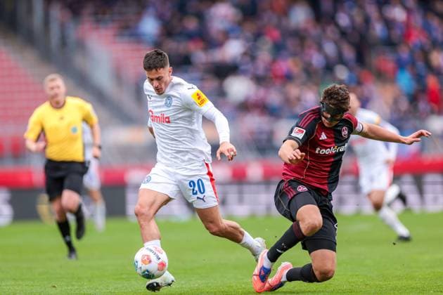 19 10 2025, 2 Bundesliga, Matchday 9, 1 FC Nürnberg Holstein Kiel, f l Adrian Kapralik Holstein Kiel , Fabio Gruber 1 FC Nürnberg , Nürnberg Max Morlock Stadion Bayern Germany xRHR PHOTO DEx Copyright: DennisxEwert RHR-FOTOx RHR-FOTO DE
