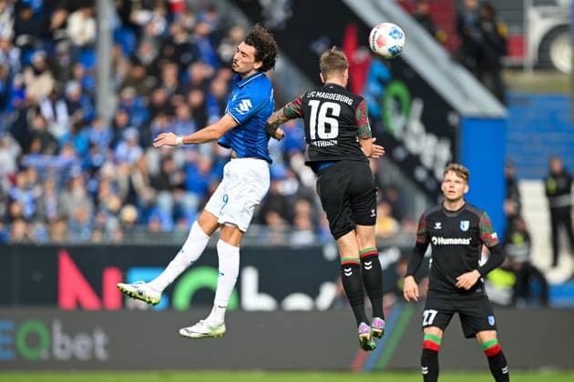 Fraser Hornby SV Darmstadt 1898, 09 in duel with Marcus Mathisen 1 FC Magdeburg, 16 , GER, SV Darmstadt 98 vs 1 FC Magdeburg Football, 2 Bundesliga, Matchday 9, Season 2025 2026, 19 10 2025 DFL REGULATIONS PROHIBIT ANY USE OF PHOTOGRAPHS AS IMAGE SEQUENCES AND OR QUASI VIDEO GER, SV Darmstadt 98 vs 1 FC Magdeburg Football, 2 Bundesliga, Matchday 9, Season 2025 2026, 19 10 2025 Darmstadt Copyright: xEibner-Pressefoto FlorianxWiegandx EP_FWD