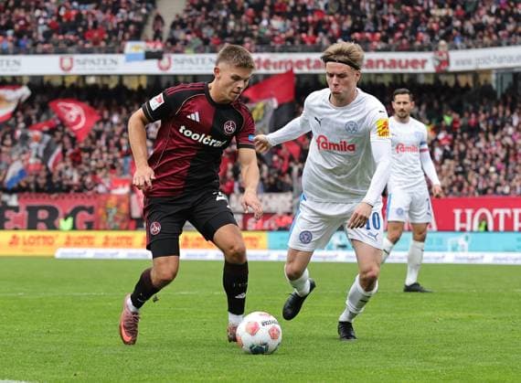 19 10 2025 Soccer Season 2025 2026 2 Soccer Bundesliga 09 Matchday 1 FC Nürnberg FCN Club KSV Holstein Kiel Storks Sportfoto Zink DaMa xdaxmax DFL regulations prohibit any use of photographs as image sequences and or quasi video only for editorial use Finn Ole Becker 25, 1 FC Nürnberg FCN Jonas Therkelsen 10, Holstein Kiel