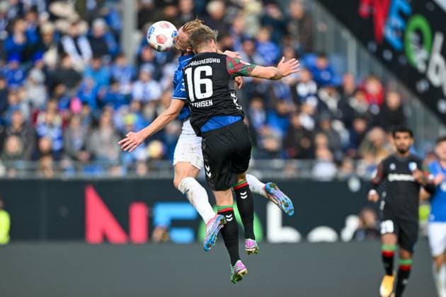 Isac Lidberg SV Darmstadt 1898, 07 in duel with Marcus Mathisen 1 FC Magdeburg, 16 , GER, SV Darmstadt 98 vs 1 FC Magdeburg Soccer, 2 Bundesliga, Matchday 9, Season 2025 2026, 19 10 2025 DFL REGULATIONS PROHIBIT ANY USE OF PHOTOGRAPHS AS IMAGE SEQUENCES AND OR QUASI VIDEO GER, SV Darmstadt 98 vs 1 FC Magdeburg Soccer, 2 Bundesliga, Matchday 9, Season 2025 2026, 19 10 2025 Darmstadt Copyright: xEibner-Pressefoto FlorianxWiegandx EP_FWD