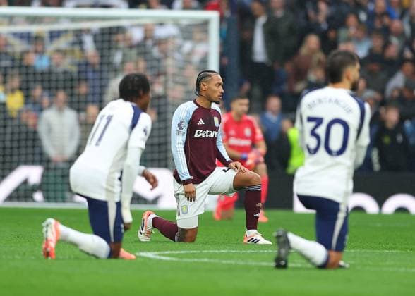 19th October 2025; Tottenham Hotspur Stadium, London, England; Premier League Football, Tottenham Hotspur versus Aston Villa; Boubacar Kamara of Aston Villa kneels in support of anti-racism  JohnxPatrickxFletcher