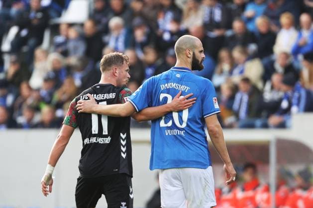 19 10 2025, xtvx, Soccer 2 Bundesliga, SV Darmstadt 98 1 FC Magdeburg v l Alexander Ahl Holmstroem 1 FC Magdeburg Aleksandar Vukotic SV Darmstadt 98 Portrait DFL DFB REGULATIONS PROHIBIT ANY USE OF PHOTOGRAPHS as IMAGE SEQUENCES and or QUASI VIDEO Darmstadt