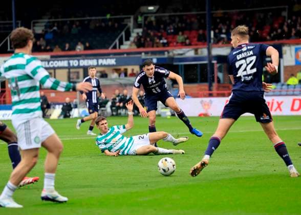 Dundee v Celtic William Hill Premiership Johnny Kenny of Celtic is tackled by Paul Digby of Dundee during the William Hill Premiership match at Dens Park, Dundee UK Newspapers OUT Copyright: xFredxPalmerx FIL-22374-0150