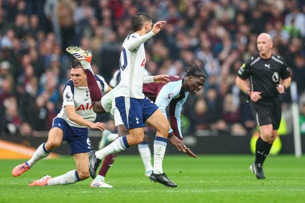 Tottenham Hotspur v Aston Villa Premier League 19 10 2025. Aston Villa midfielder Amadou Onana (24) is tackled by Tottenham Hotspur midfielder Joao Palhinha (6) during the Premier League match between Tottenham Hotspur and Aston Villa at Tottenham Hotspur Stadium, London, United Kingdom on 19 October 2025. London Tottenham Hotspur Stadium London United Kingdom Editorial use only DataCo restrictions apply See www.football-dataco.com , Copyright: xToyinxOshodix PSI-23050-0013