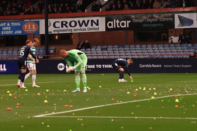 19th October 2025; Dens Park, Dundee, Scotland; Scottish Premiership Football, Dundee versus Celtic; Players clear the pitch after Celtic fans had disrupted the game by throwing balls on to get the game halted  DavidxYoung