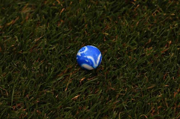 19th October 2025; Dens Park, Dundee, Scotland; Scottish Premiership Football, Dundee versus Celtic; A ball on the pitch after Celtic fans had disrupted the game by throwing balls on to get the game halted  DavidxYoung