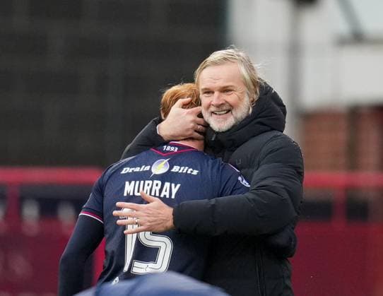 Dundee Head Coach Steven Pressley embraces Simon Murray of Dundee. Dundee v Celtic, William Hill Scottish Premiership, Football, Dens Park, Dundee, Scotland, UK - 19 Oct 2025Dundee Dens Park United Kingdom EDITORIAL USE ONLY No use with unauthorised audio, video, data, fixture lists, club league logos or live services. Online in-match use limited to 120 images, no video emulation. No use in betting, games or single club league player publications.  Copyright: xStuartxWallace Shutterstockx 15545861cx