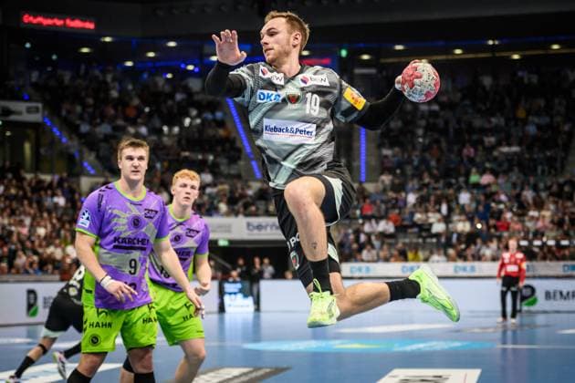 Mathias Gidsel Fuechse Berlin, 19 Jump into the circle to the Stuttgart goal GER, TVB 1898 Stuttgart Fuechse Berlin, DAIKIN HBL, Handball, Bundesliga, Matchday 9, 2025 2026 season, 19 10 2025 GER, TVB 1898 Stuttgart Fuechse Berlin, DAIKIN HBL, Handball, Bundesliga, Matchday 9, 2025 2026 season, 19 10 2025 Stuttgart Copyright: xSandyxDinkelackerx EP_SDR