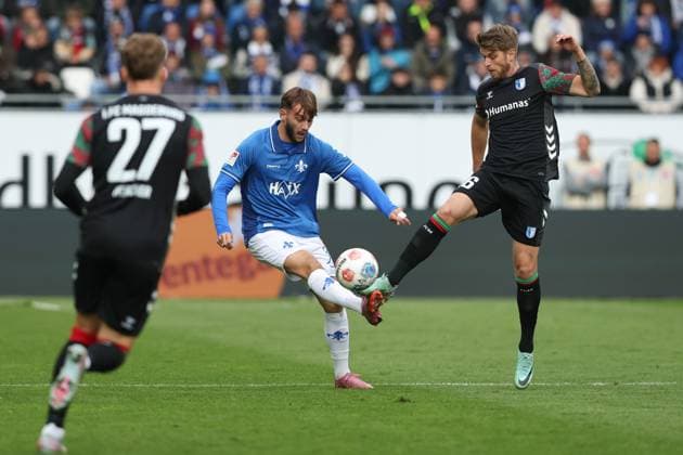 Killian Corredor SV Darmstadt 98,34 vs Marcus Mathisen 1 FC Magdeburg,16 2 Soccer Bundesliga Season 2025 2026 SV Darmstadt 98 vs 1 FC Magdeburg at Merck Stadion am Böllenfalltor in Darmstadt Action,Soccer,Man,Men,Germany,19 10 2025