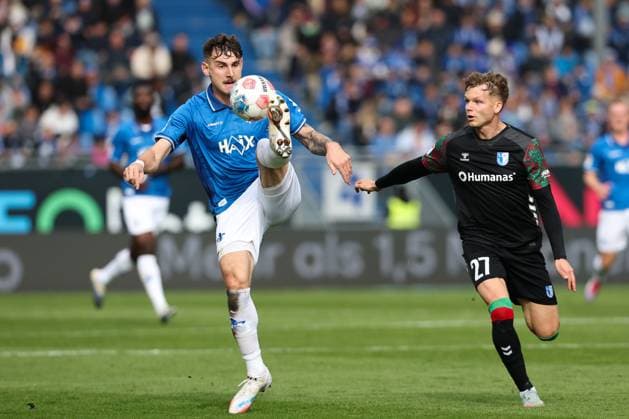 Matej Maglica SV Darmstadt 98,5 vs Philipp Hercher 1 FC Magdeburg,27 2 Soccer Bundesliga Season 2025 2026 SV Darmstadt 98 vs 1 FC Magdeburg at Merck Stadion am Böllenfalltor in Darmstadt Action,Soccer,Man,Men,Germany,19 10 2025