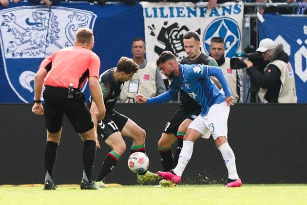 Marco Richter SV Darmstadt 98,23 vs Alexander Nollenberger 1 FC Magdeburg,17 and Falko Michel 1 FC Magdeburg,21 2 Soccer Bundesliga Season 2025 2026 SV Darmstadt 98 vs 1 FC Magdeburg at Merck Stadion am Böllenfalltor in Darmstadt Action,Soccer,Man,Men,Germany,19 10 2025