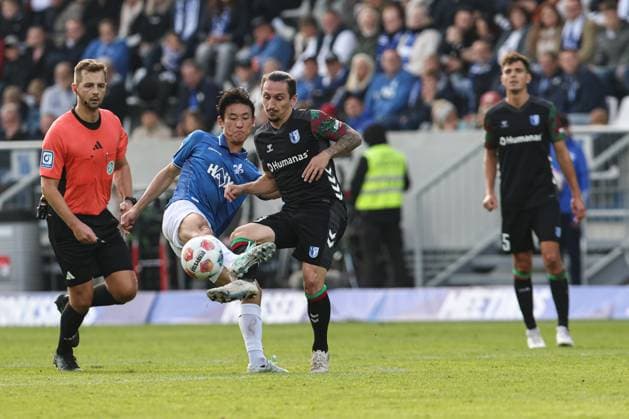 Hiroki Akiyama SV Darmstadt 98,16 vs Baris Atik 1 FC Magdeburg,23 2 Soccer Bundesliga Season 2025 2026 SV Darmstadt 98 vs 1 FC Magdeburg at Merck Stadion am Böllenfalltor in Darmstadt Action,Soccer,Man,Men,Germany,19 10 2025