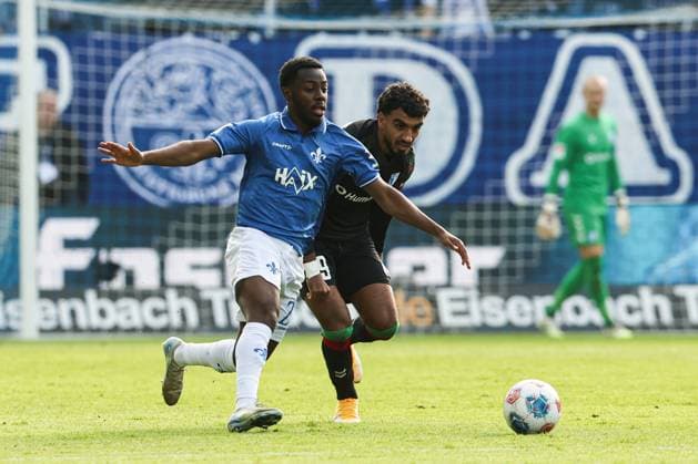 Merveille Papela SV Darmstadt 98,21 vs Rayan Ghrieb 1 FC Magdeburg,29 2 Soccer Bundesliga Season 2025 2026 SV Darmstadt 98 vs 1 FC Magdeburg at Merck Stadion am Böllenfalltor in Darmstadt Action,Soccer,Man,Men,Germany,19 10 2025