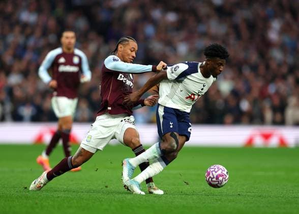 19th October 2025; Tottenham Hotspur Stadium, London, England; Premier League Football, Tottenham Hotspur versus Aston Villa; Boubacar Kamara of Aston Villa challenges Mohammed Kudus of Tottenham Hotspur  JohnxPatrickxFletcher